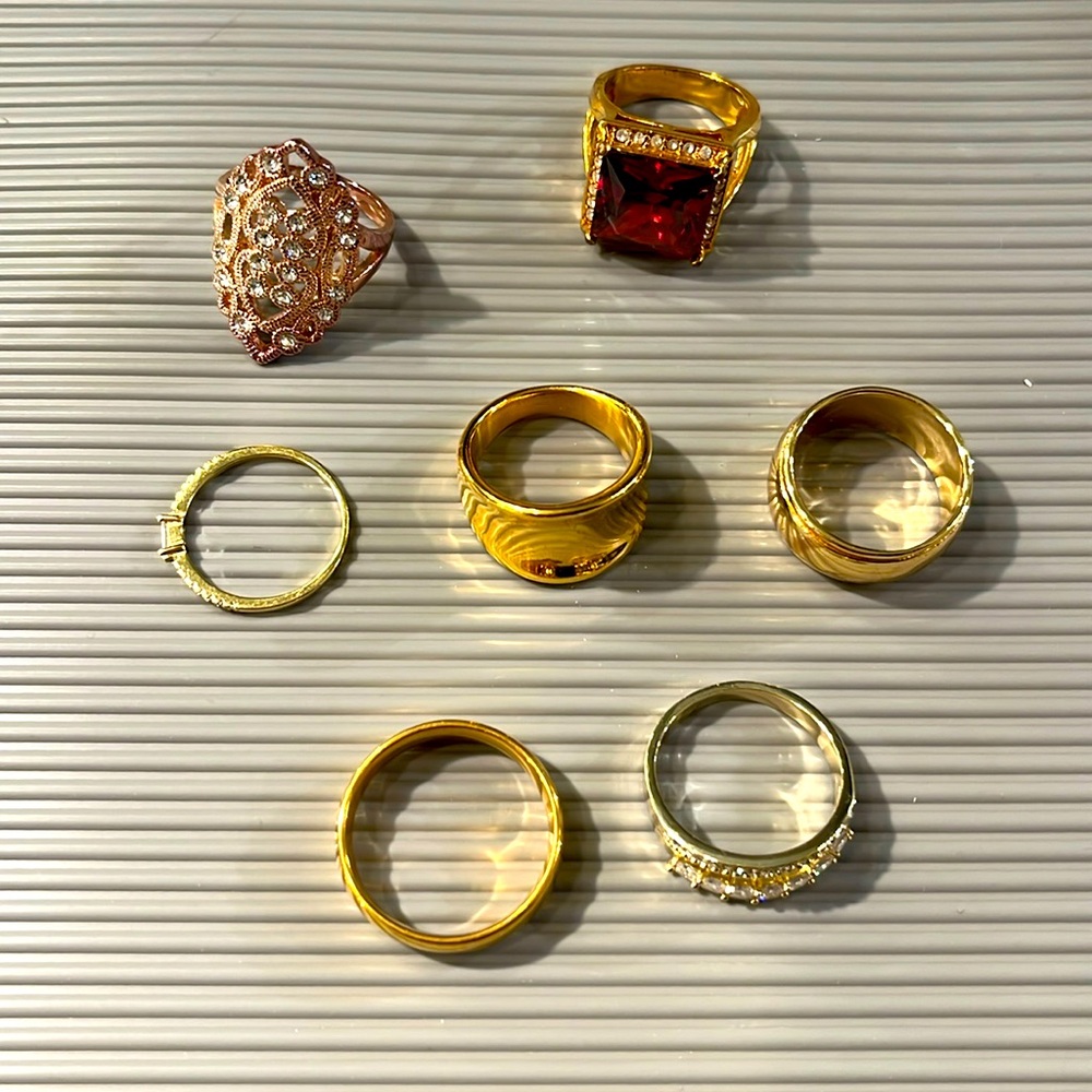 Assorted gold plated rings - size 7-10
